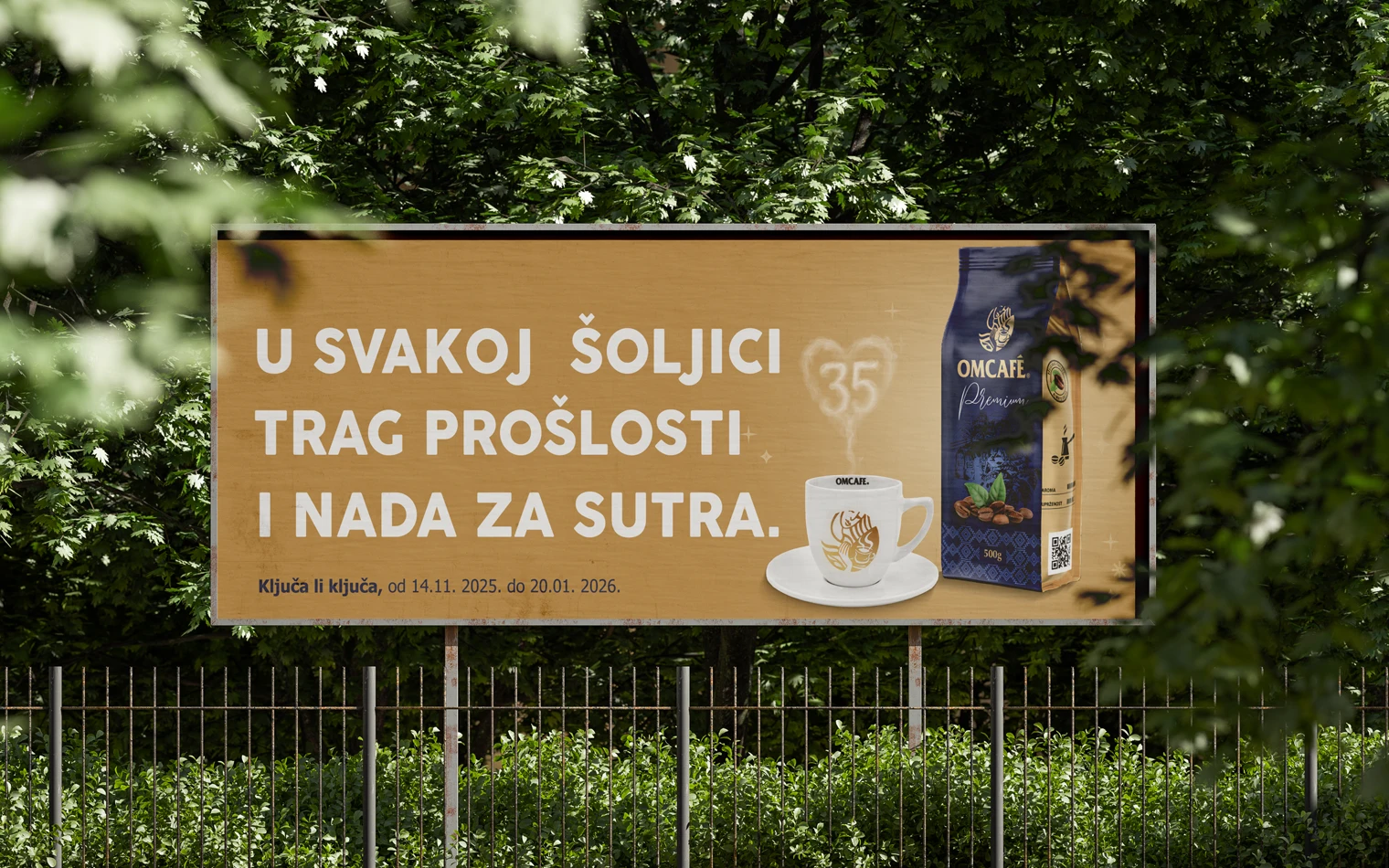 OMCafé 2025 jubilarni billboard celebrating the prize game with vibrant visuals and festive design